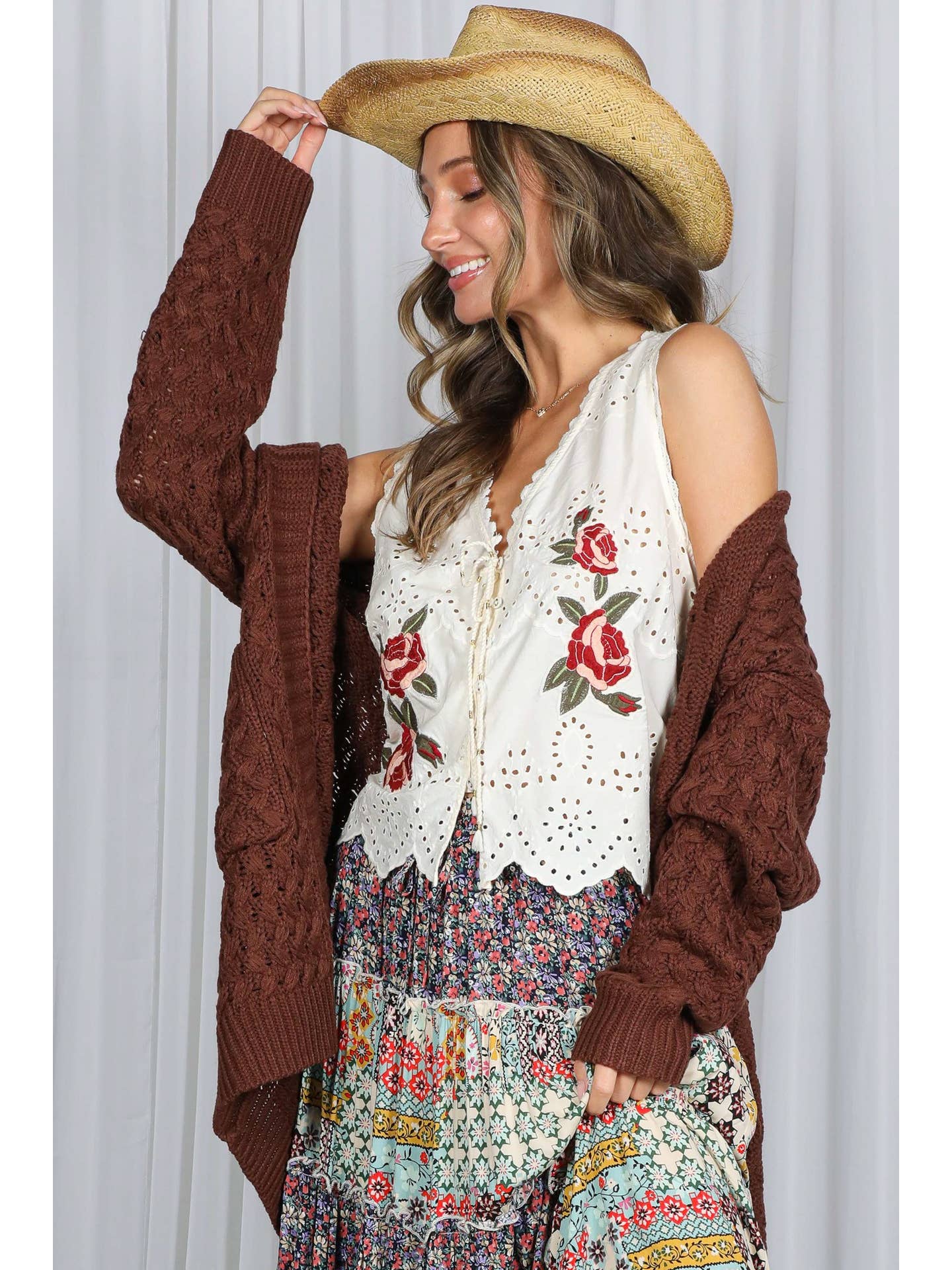 Cardigan lavorato a maglia all'uncinetto con tasche applicate